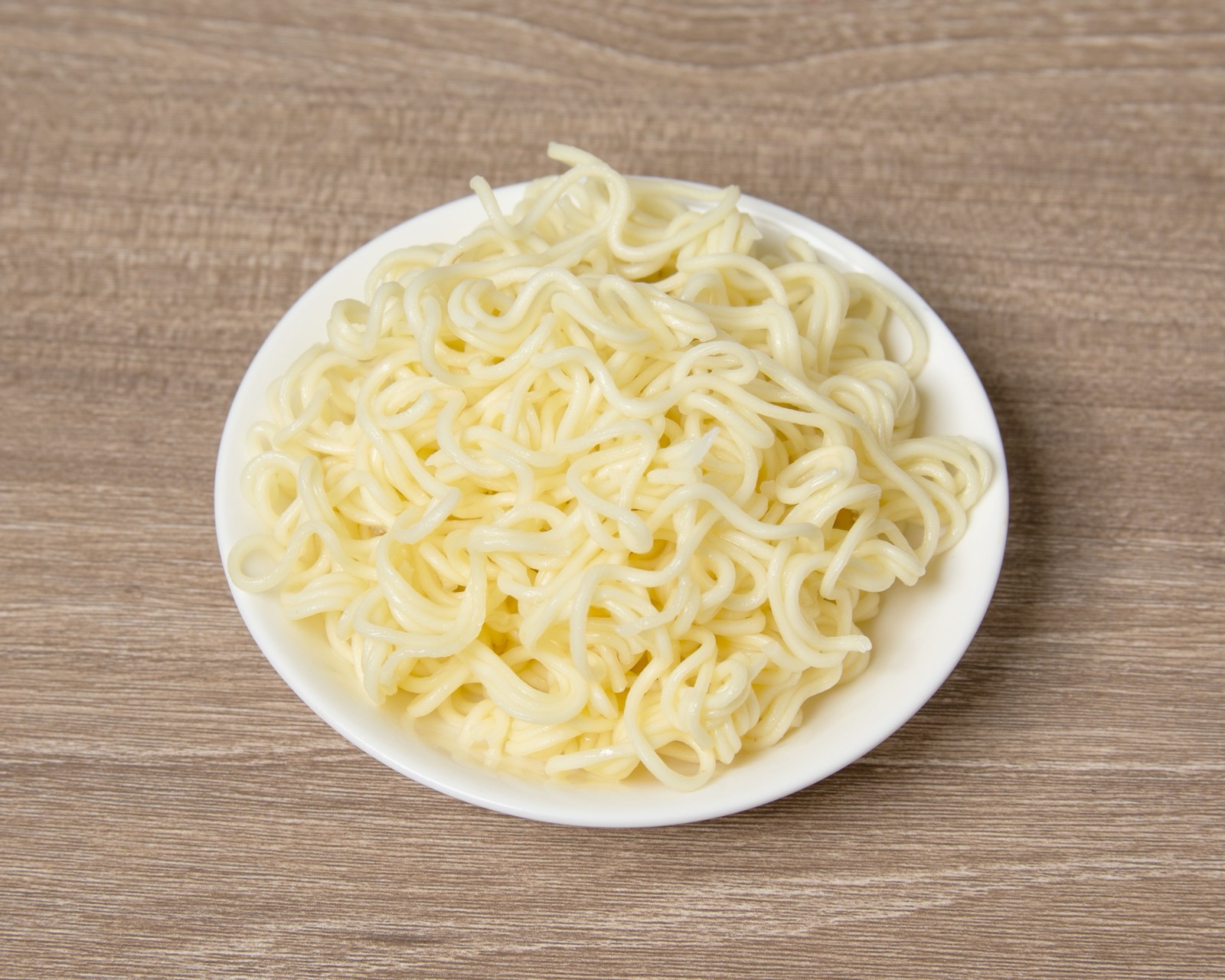 Silky egg noodles ready to be added to a malatang bowl